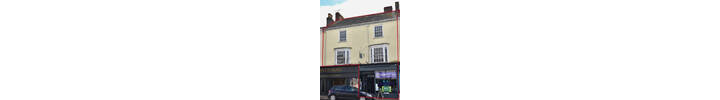 1. Honiton Before Front of Building.png