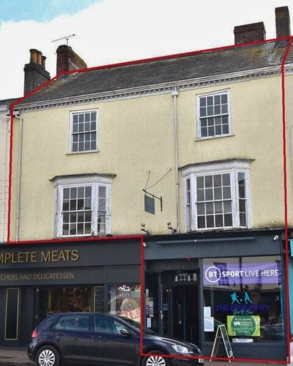 1. Honiton Before Front of Building.png