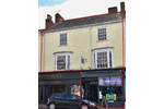 1. Honiton Before Front of Building.png
