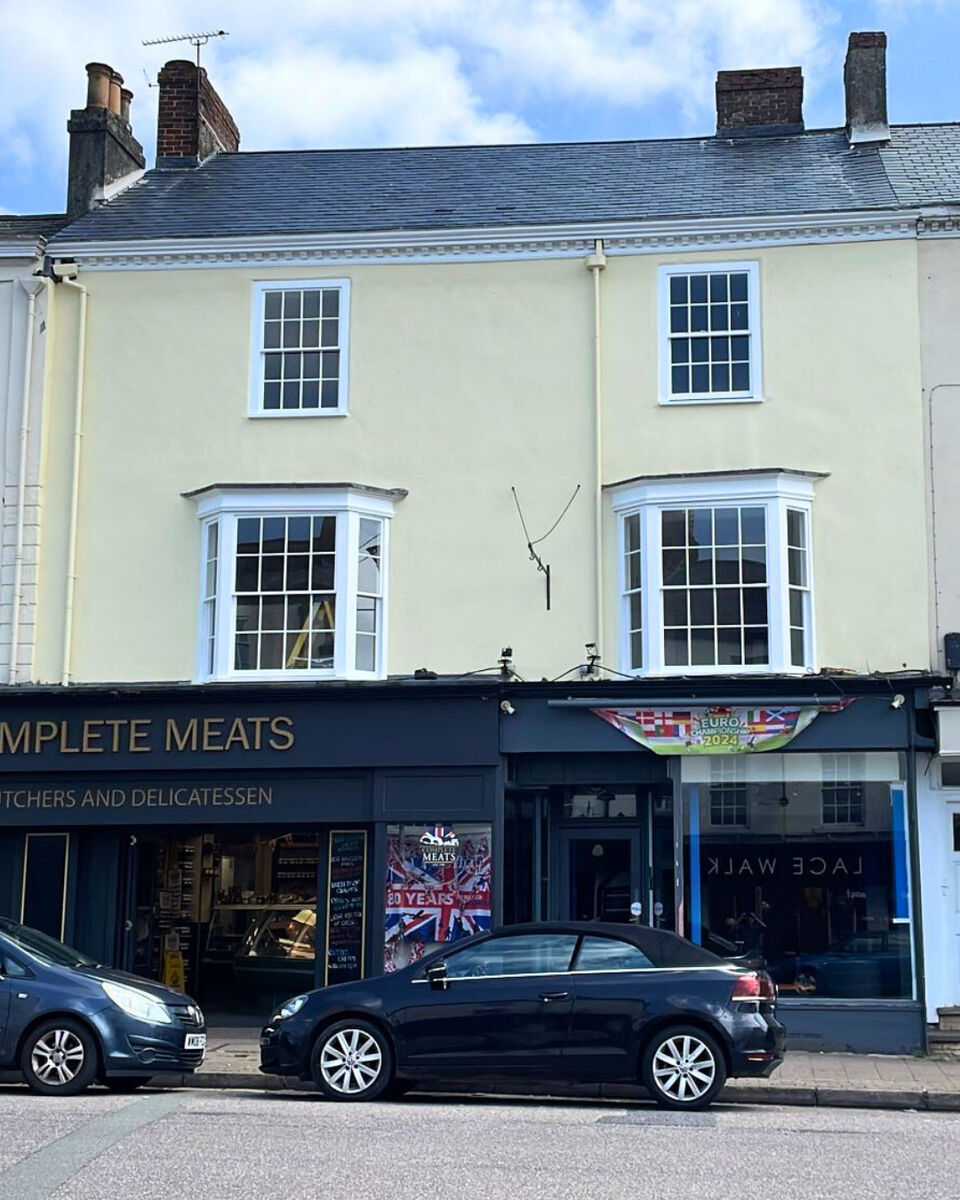 3. Honiton After Front of Building.png